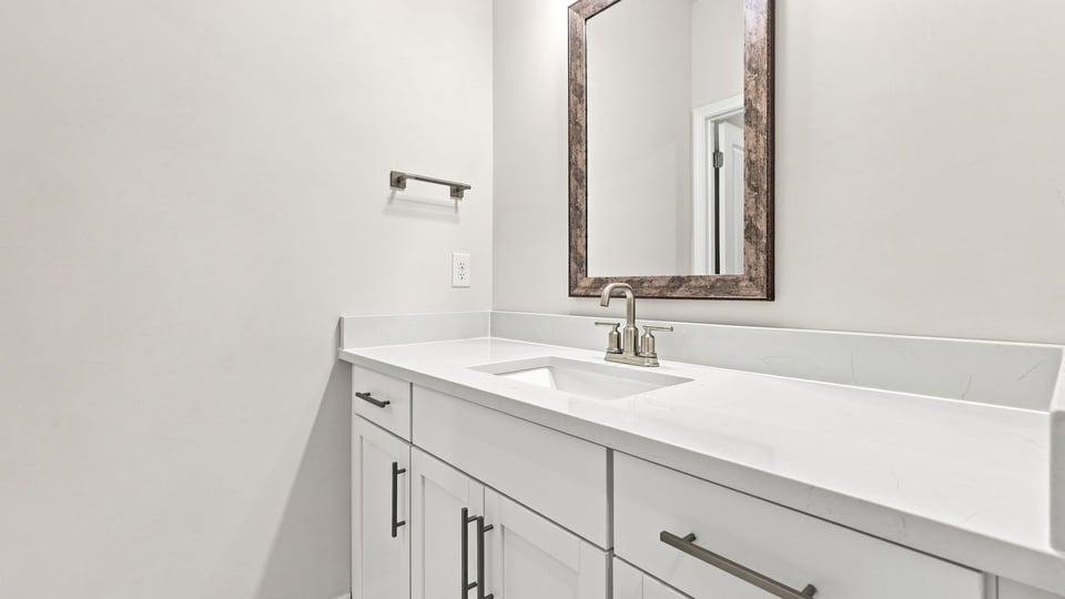 Bathroom with vanity sink.
