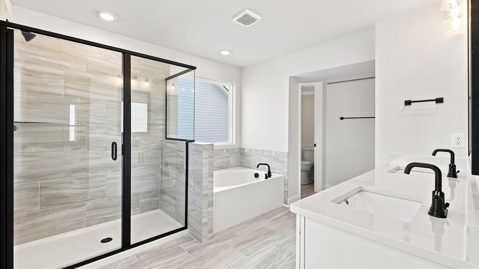 Bathroom with vanity sinks.