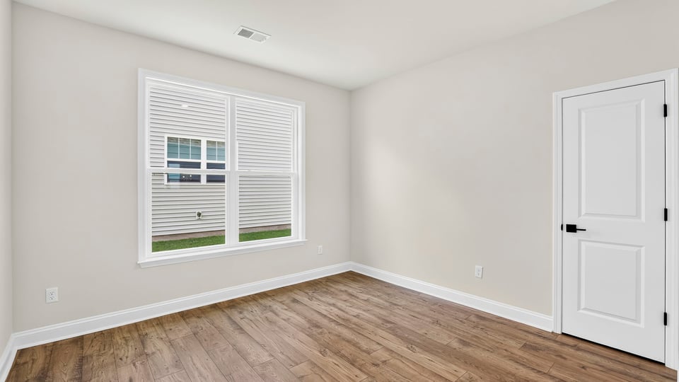 Bedroom with windows.