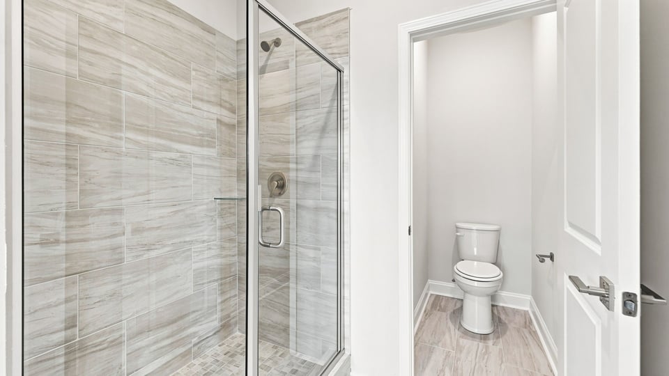 Bathroom with walk in shower.