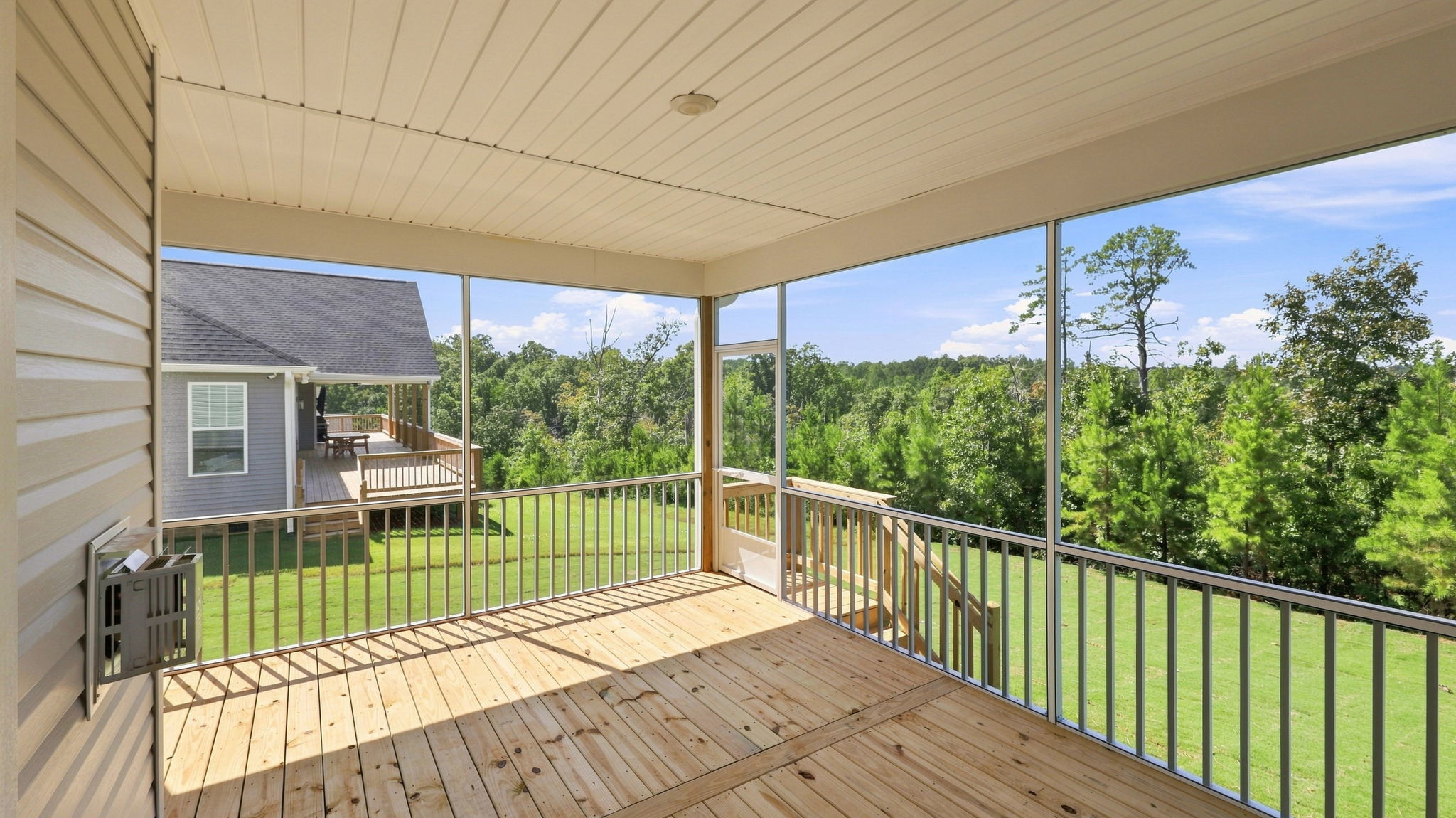 Back exterior with large backyard.