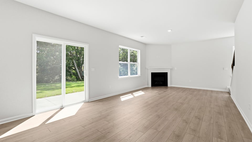 Livingroom with window and fireplace.