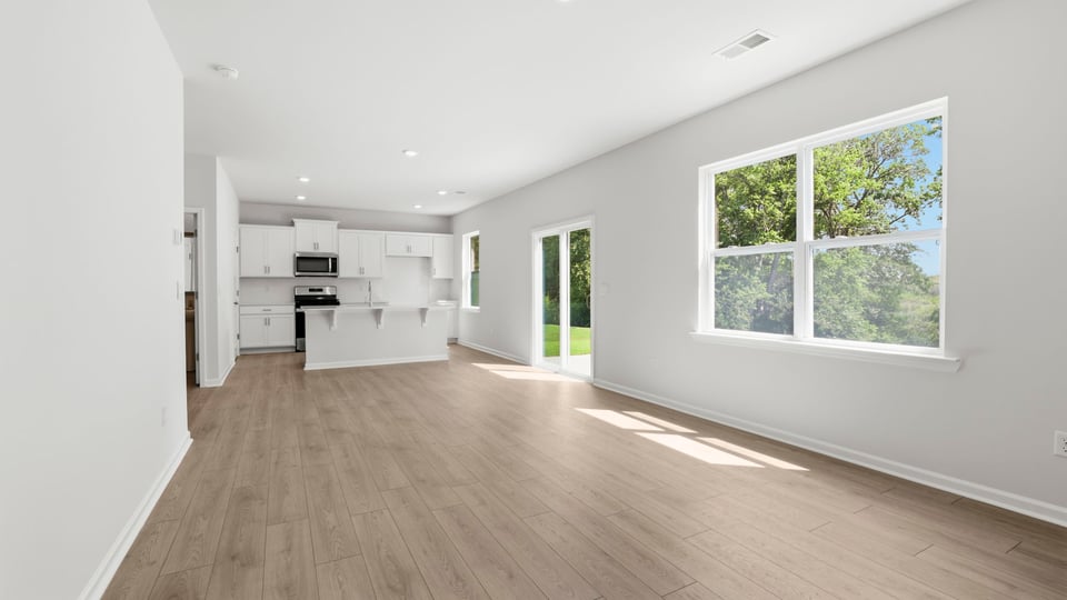 Livingroom with window and fireplace.