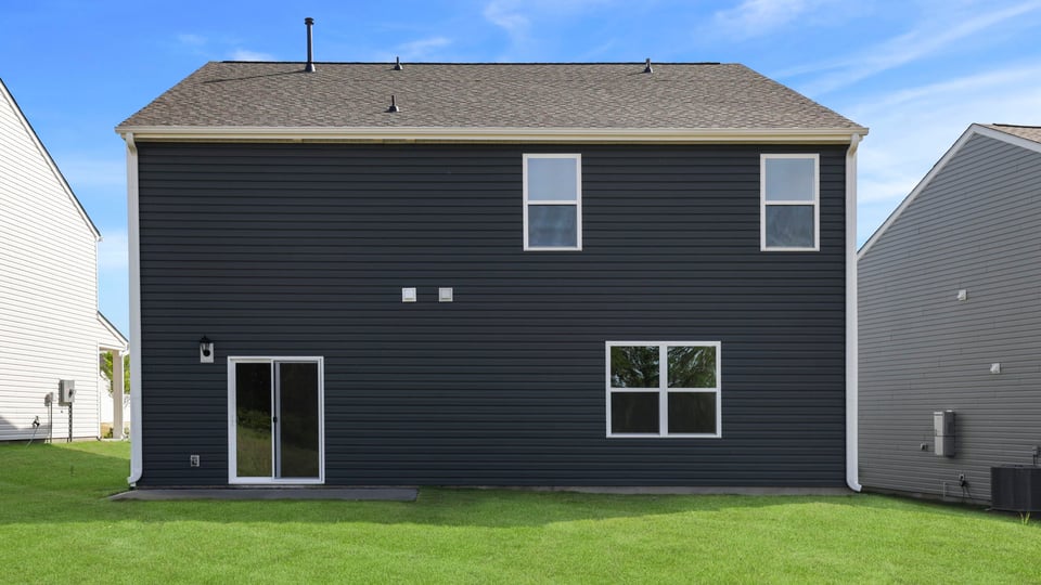 Large backyard of home.