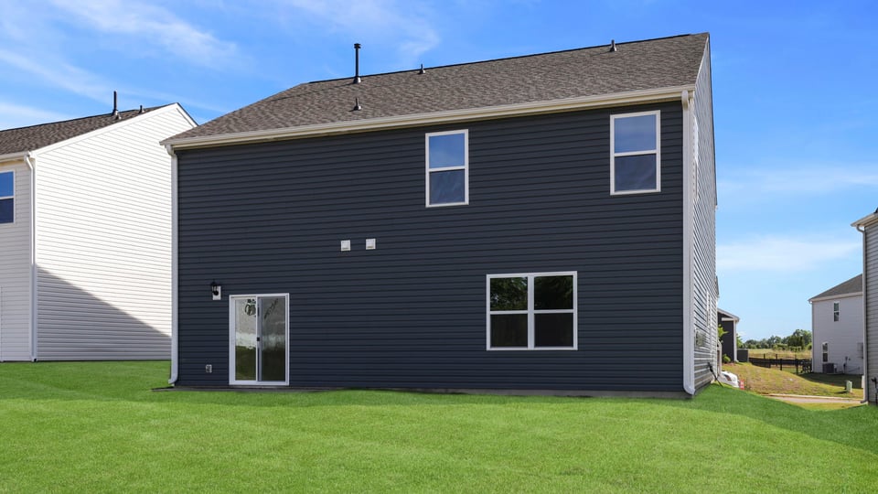 Large backyard of home.