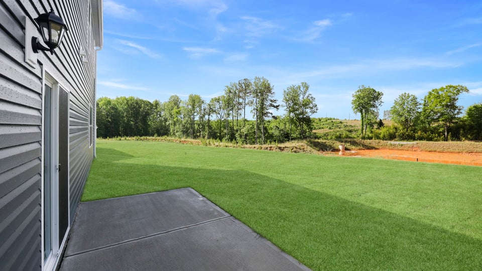 Large backyard of home.
