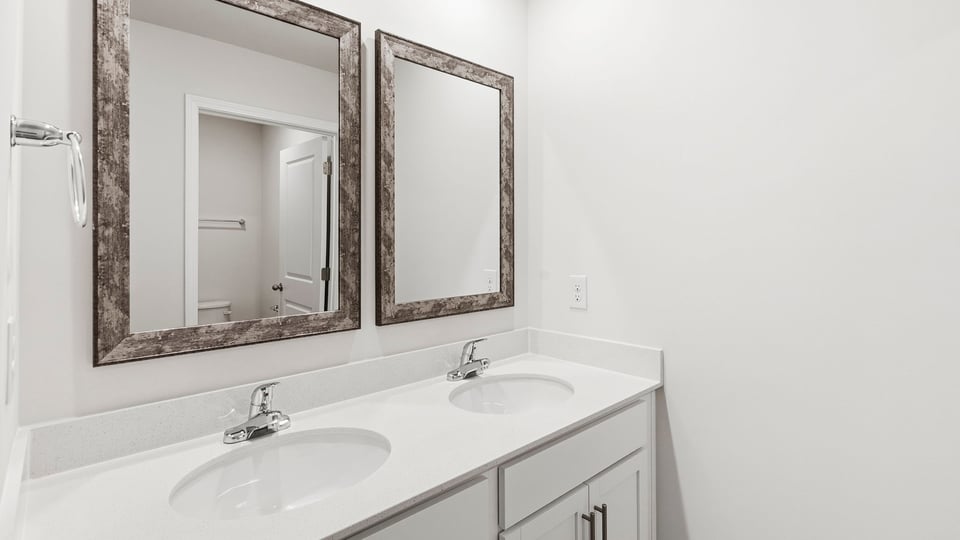 Bathroom with double vanity sink.