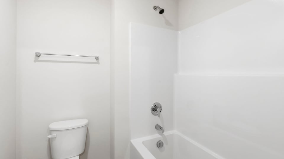 Bathroom with bathtub.