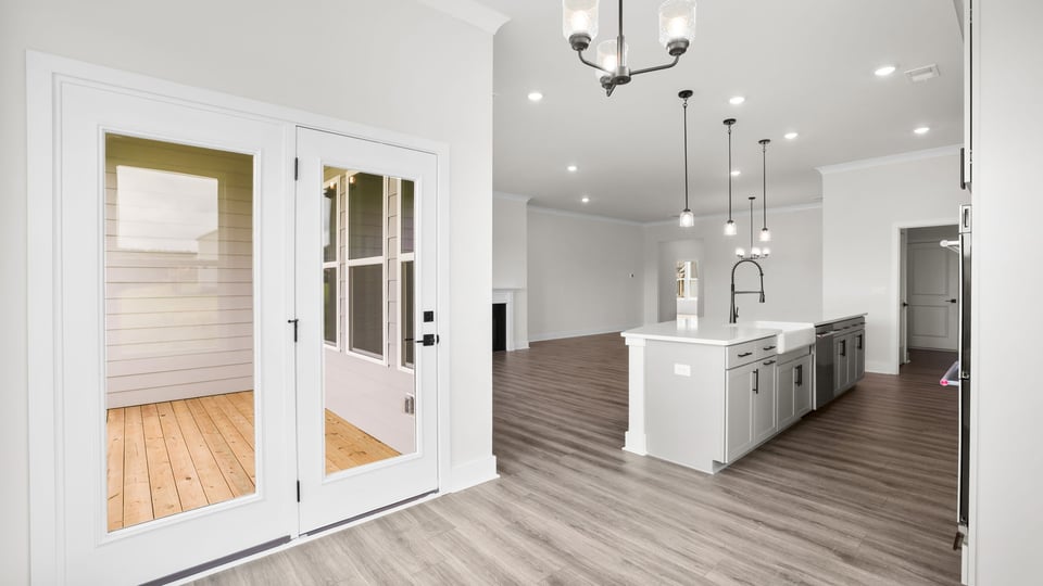 View of kitchen from sunroom.