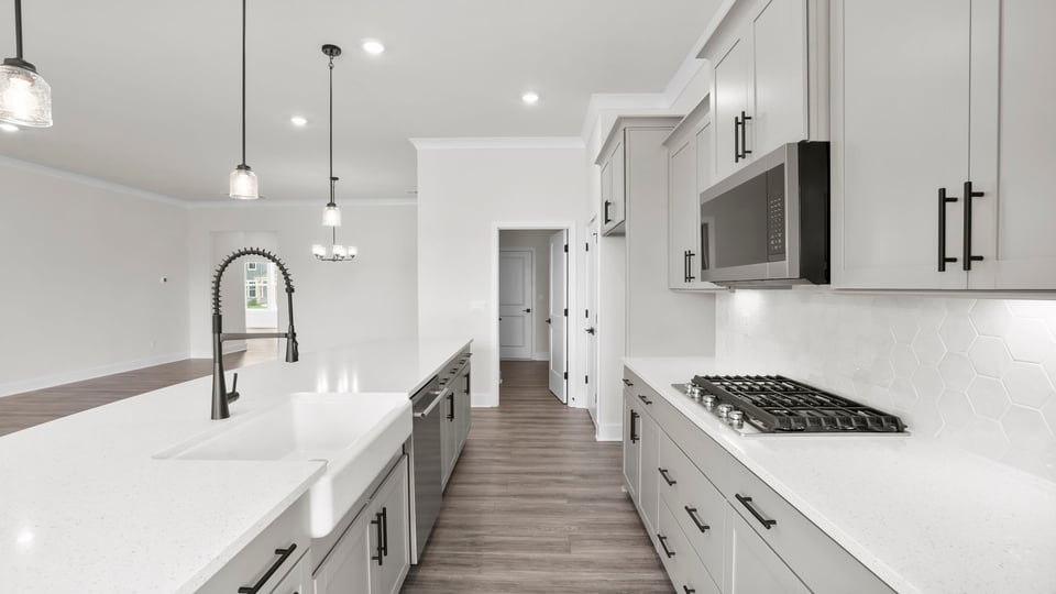 Kitchen with stainless steel appliances.