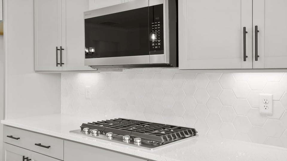 Kitchen with stainless steel appliances.