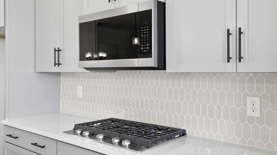 Kitchen with stainless steel appliances.