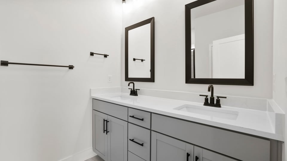 Bathroom with double vanity sink.