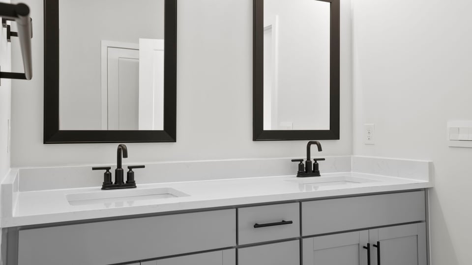 Bathroom with double vanity sink.