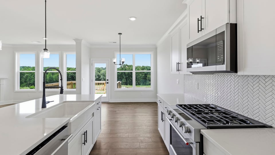 Kitchen with stainless steel appliances.