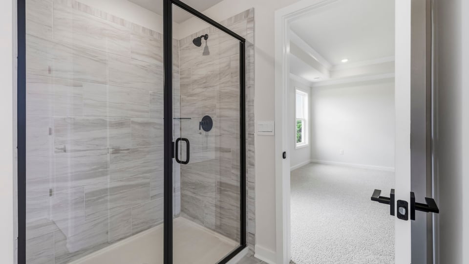 Bathroom with walk in shower.