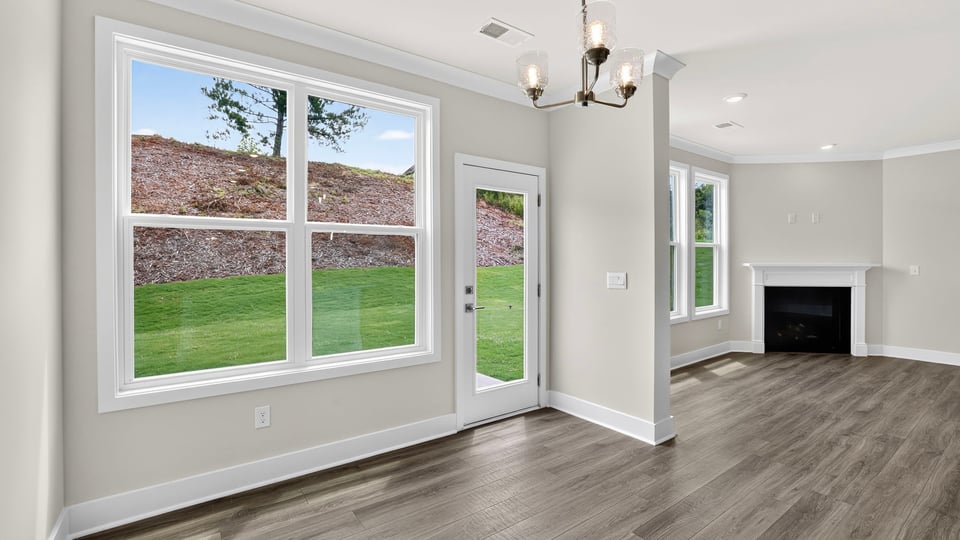 Dining area with view of kitchen.