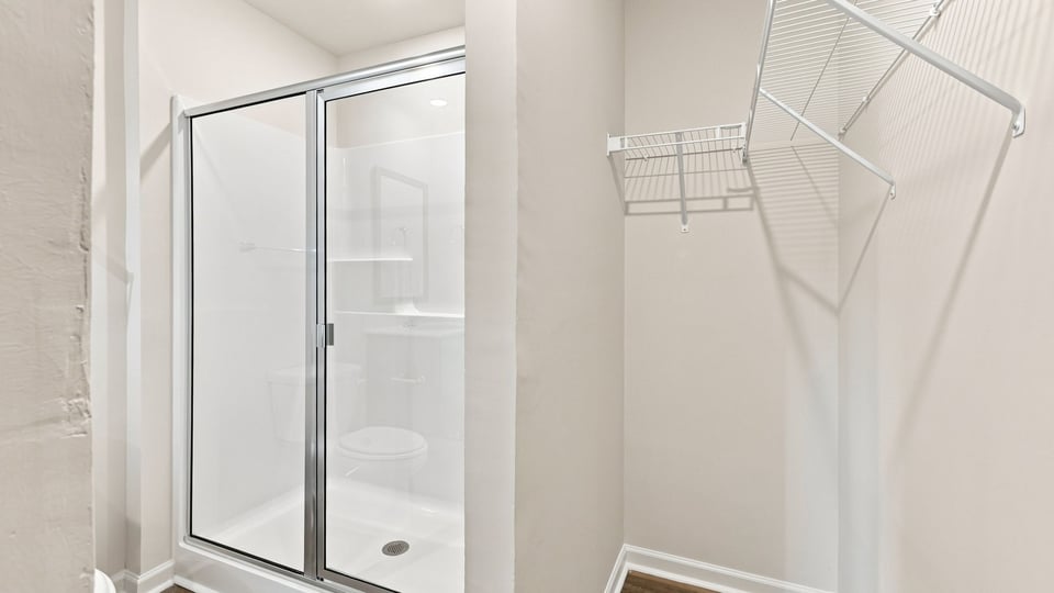 Bathroom with walk in shower.