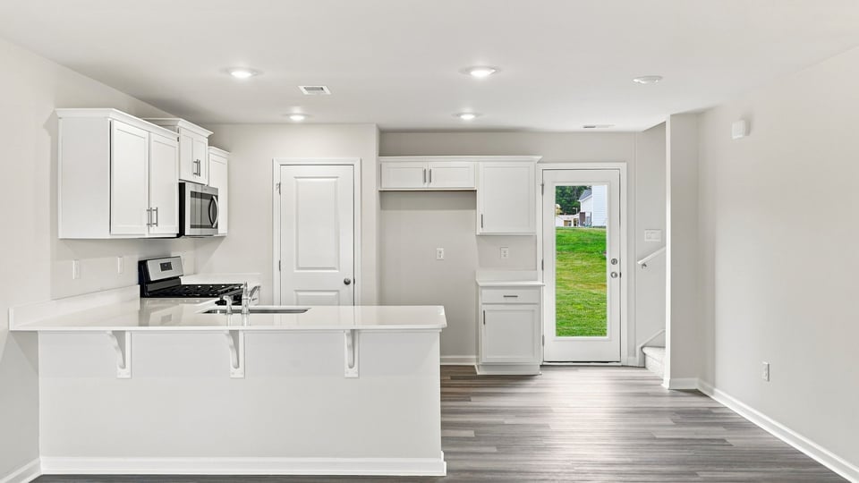 Kitchen with stainless steel appliances.