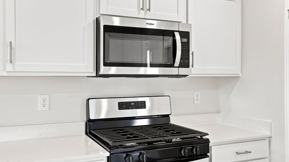 Kitchen with stainless steel appliances.