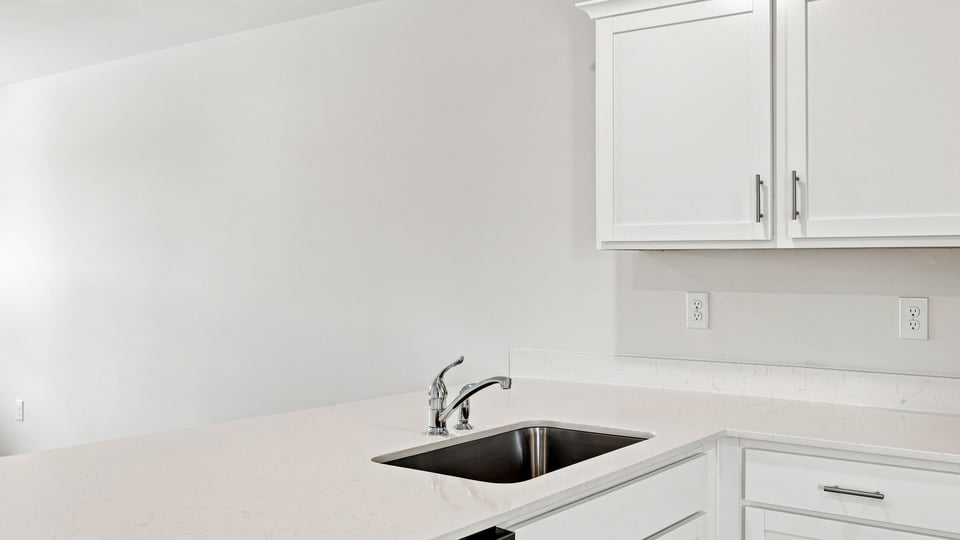 Kitchen with stainless steel appliances.