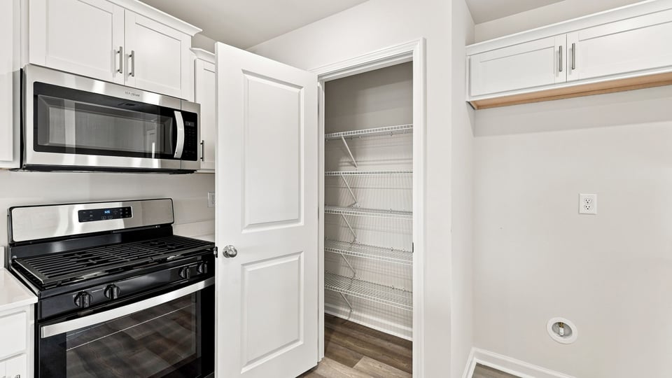 Kitchen with stainless steel appliances.