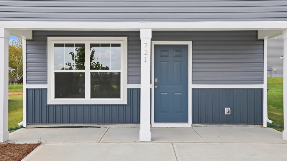 Covered patio at front of home.