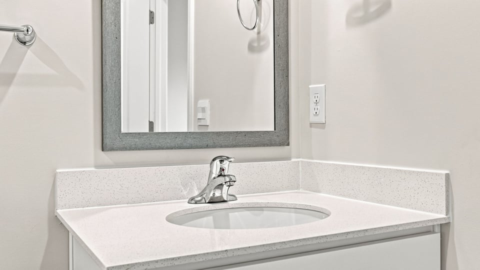 Bathroom with single vanity sink.