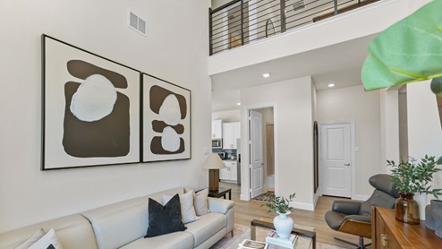 Interior living area with view of overlook railing