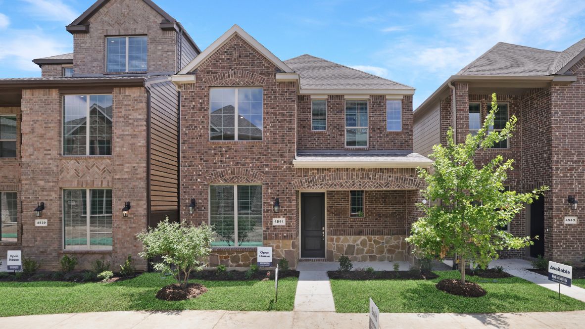 Discover the Lariat Floor Plan at The Avenue in Allen, TX  Welcome to the Lariat, a stunning 3-bedroom, 3.5-bathroom, 2-story home offering 1,614 sq. ft. of modern living space. As you arrive, the timeless exterior with brick detailing, large windows, and a charming front porch creates an inviting curb appeal. Situated in The Avenue, a master-planned, mixed-use community, this home features a rear-entry garage and a beautiful greenway-facing front yard, blending urban convenience with a serene neighborhood feel.  Step inside and be greeted by an open-concept living space, where natural light pours through large windows, enhancing the sleek picture-frame cabinetry, stainless steel appliances, and quartz or granite countertops in the chef-inspired kitchen. A private guest suite on the main level provides flexibility, while the second floor boasts a luxurious primary suite with a walk-in closet, spa-like en-suite bath, and an additional bedroom with its own full bath.  Located in the top-rated Allen ISD with smart home features throughout, this home offers easy access to major highways. Plus, residents will soon enjoy a vibrant outdoor plaza with a food hall, water features, and a container park—the perfect place to live, work, and play!