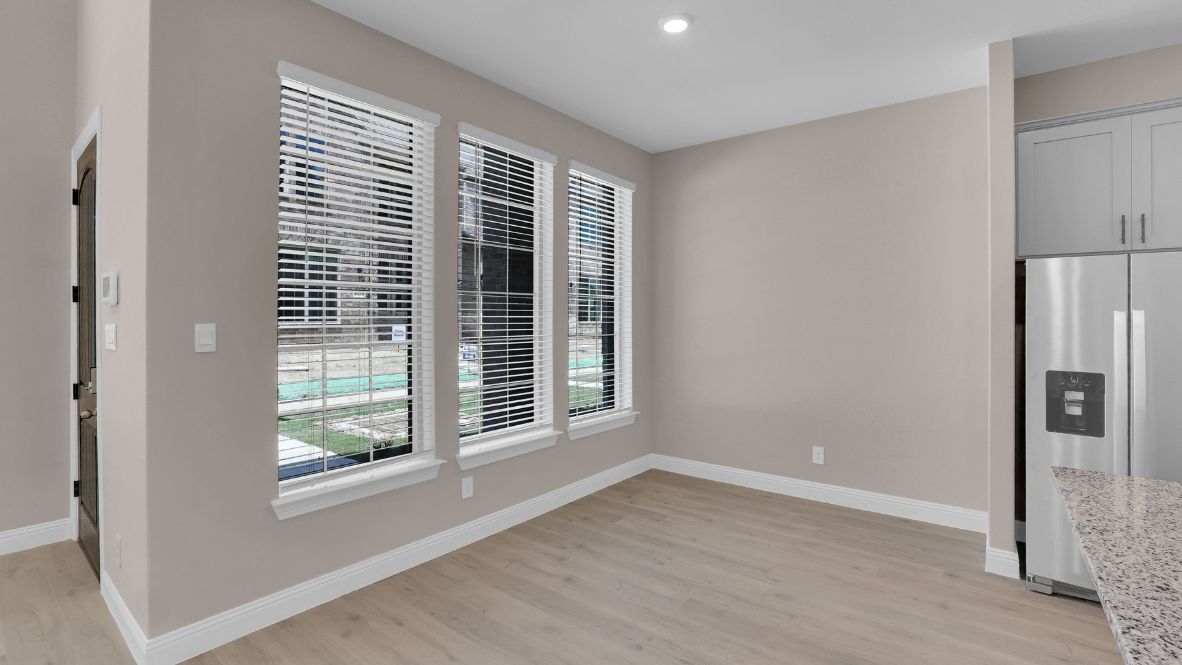 Explore the Longhorn Floor Plan at The Avenue in Allen, TX  Introducing the Longhorn, a beautifully designed 4-bedroom, 3.5-bathroom, 3-story home with 2,223 sq. ft. of spacious and modern living. The striking brick exterior, expansive windows, and sophisticated architectural details create unmatched curb appeal. Located in The Avenue, this home offers a rear-entry garage and a charming greenway-facing front, blending privacy with vibrant community living.  Step through the front door into a bright, open-concept living space, where natural light highlights the picture-frame cabinetry, stainless steel appliances, and quartz or granite countertops in the chef-inspired kitchen. The first floor features a welcoming family and dining area, along with a powder bath for guests.  On the second floor, you’ll find two spacious bedrooms, including a luxurious primary suite with a spa-like bath and large walk-in closet. The open-to-below design creates an airy, grand feel. The third floor offers two additional bedrooms and a game room, perfect for entertainment or a private retreat.  Situated in top-rated Allen ISD, this smart home has quick access to major highways. Plus, residents will enjoy a coming-soon outdoor plaza with a food hall, water features, and a container park—the ultimate place to live, work, and play!