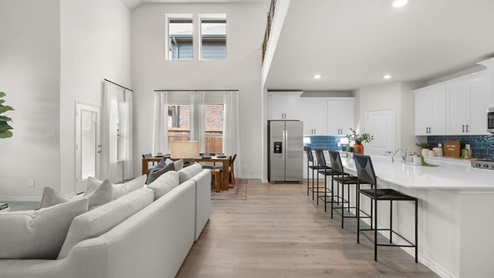 Interior kitchen with center island open to living area