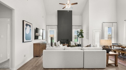 Interior living area with large windows and fire place
