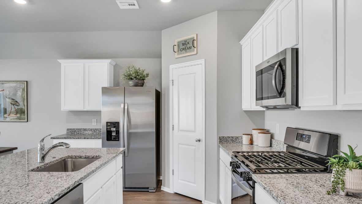 Welcome to the Brook Chase community in Broken Arrow, Oklahoma, where modern living meets small-town charm. Introducing our newest addition to this friendly neighborhood: The Cali floor plan, a buyer favorite nationwide.  Step inside Brook Chase and be greeted by the communities stunning brick and rock exterior elevations, a testament to its timeless appeal. Inside the Cali, you'll find 1788 square feet of thoughtfully designed space. A 4-bedroom, 2-bathroom home is perfect for families of all sizes.  The heart of the home is the spacious kitchen, featuring painted cabinetry, granite countertops, and luxury vinyl wood flooring. This area seamlessly flows into the combination living and dining area, making it ideal for entertaining guests or enjoying family meals.  Retreat to the primary bedroom, where relaxation awaits. Here, you'll find an attached bathroom complete with a walk-in closet, double vanity, and a separate toilet for added privacy. Say goodbye to sharing sinks - the Cali ensures ample space for everyone's morning routine.  Not only does the Cali offer functional living space, but it also boasts stylish finishes throughout. From the timeless marble tile surround in the primary and secondary bathrooms to the cozy carpeted floors in the bedrooms, every detail has been carefully considered to create a comfortable and inviting atmosphere.  Don't miss your chance to be a part of this vibrant community and own your dream home in Brook Chase. Contact us today to schedule a tour and experience the Cali floor plan for yourself. Your new home awaits!