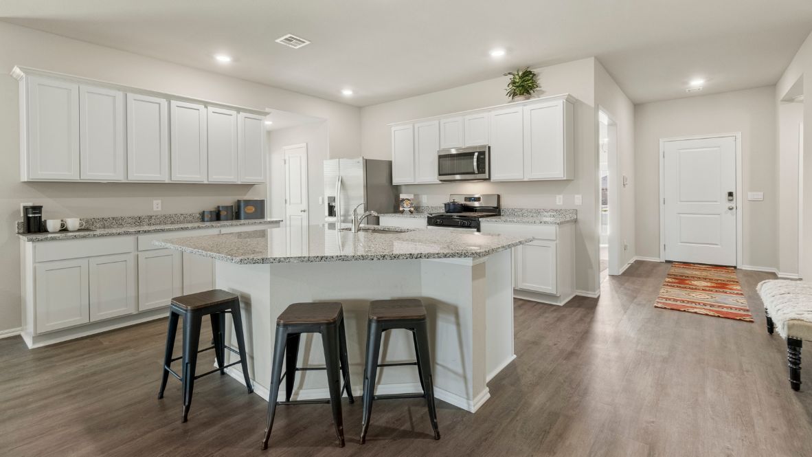 Welcome to the Kingston floor plan, the ultimate haven for large families and gracious hosts in The Brook Chase Community, nestled in the charming locale of Broken Arrow, Oklahoma. As a buyer favorite, the Kingston offers a single-story layout with 4 bedrooms, 3 baths, plus a flex room that can be tailored to your needs, boasting a spacious 2031 square feet of living space.  From the outside, admire the traditional brick or brick and rock exterior, exuding beautiful curb appeal that sets the stage for a warm welcome. Step inside to discover an open concept layout, featuring painted white shaker-style cabinets, granite countertops, and stainless steel appliances, including a gas range, creating a culinary haven that overlooks the dining area and spacious living room.  Gather with loved ones in the large central family room, adorned with an extra-large kitchen island that can easily seat up to 5 people, making it ideal for hosting gatherings or holiday celebrations.  Retreat to the comfort of the bedrooms, with plush carpeting enhancing coziness, while the main living areas and halls showcase durable luxury vinyl wood flooring, marrying style with practicality.  Indulge in the luxury of the primary suite, complete with a dual vanity, huge walk-in closet, separate water closet, and a large walk-in shower, offering a serene sanctuary for relaxation. Plus, enjoy the convenience of smart home features included in every Kingston floor plan.  Experience the epitome of gracious living in the Kingston floor plan at The Brook Chase Community. Schedule a tour today and make your dream home a reality in Broken Arrow, Oklahoma.