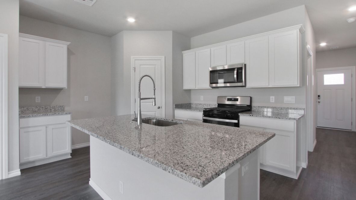 Welcome to the Denton floor plan, where modern charm meets cozy elegance in the heart of The Conrad Village Community, nestled in scenic Bixby, Oklahoma. This one-story haven offers 3 bedrooms, 2 baths, and a generous 1575 square feet of living space, perfect for those seeking a warm and inviting retreat.  From the outside, admire the traditional brick or brick and rock exterior, exuding timeless allure and modern curb appeal. Step inside to discover an open concept layout that effortlessly combines style and functionality. The kitchen features painted white shaker-style cabinets, granite countertops, and stainless steel appliances, creating a welcoming atmosphere that overlooks the dining area and living room, ideal for gatherings and entertaining.  As you explore further, you'll find comfort in every corner. Sink your feet into plush carpeting in the bedrooms, while the main living areas and halls boast durable luxury vinyl wood flooring, adding a touch of rustic charm to your everyday life. Indulge in the luxury of the primary suite, complete with a dual vanity, huge walk-in closet, separate water closet, and a large walk-in shower, ensuring your comfort and convenience.  Experience the convenience of smart home features included in every Denton floor plan. Schedule a tour today and discover your perfect blend of modern luxury and cozy warmth at The Conrad Village Community in Bixby, Oklahoma.