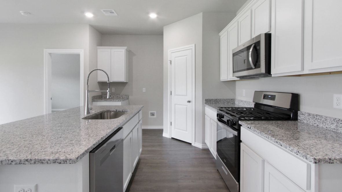 Welcome to the Denton floor plan, where modern charm meets cozy elegance in the heart of The Conrad Village Community, nestled in scenic Bixby, Oklahoma. This one-story haven offers 3 bedrooms, 2 baths, and a generous 1575 square feet of living space, perfect for those seeking a warm and inviting retreat.  From the outside, admire the traditional brick or brick and rock exterior, exuding timeless allure and modern curb appeal. Step inside to discover an open concept layout that effortlessly combines style and functionality. The kitchen features painted white shaker-style cabinets, granite countertops, and stainless steel appliances, creating a welcoming atmosphere that overlooks the dining area and living room, ideal for gatherings and entertaining.  As you explore further, you'll find comfort in every corner. Sink your feet into plush carpeting in the bedrooms, while the main living areas and halls boast durable luxury vinyl wood flooring, adding a touch of rustic charm to your everyday life. Indulge in the luxury of the primary suite, complete with a dual vanity, huge walk-in closet, separate water closet, and a large walk-in shower, ensuring your comfort and convenience.  Experience the convenience of smart home features included in every Denton floor plan. Schedule a tour today and discover your perfect blend of modern luxury and cozy warmth at The Conrad Village Community in Bixby, Oklahoma.