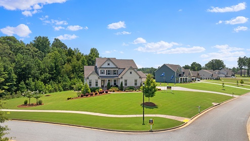 Genesee community model home exterior streetscape at in Newnan, GA