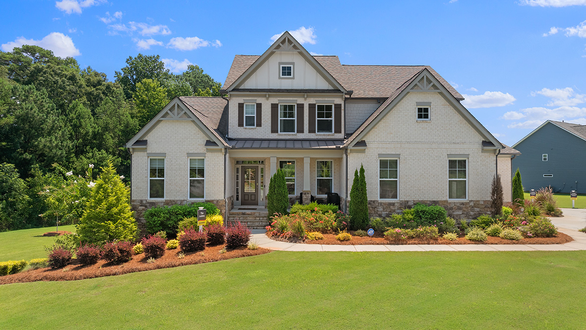 genesee ashley model home exterior with great landscaping in newnan, ga