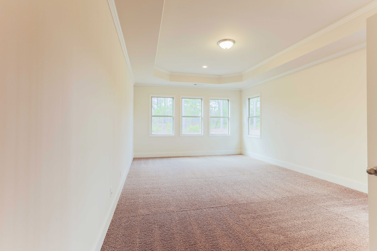 The Americana Primary Bedroom at Genesee in Newnan, Georgia