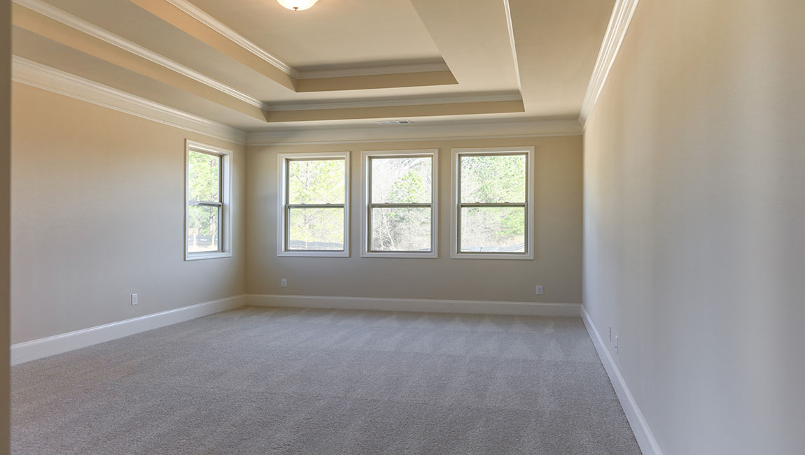 The Americana Primary Bedroom at Genesee in Newnan, Georgia
