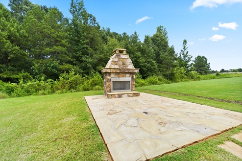 The Ashley E Exterior Fireplace at Genesee in Newnan, Georgia