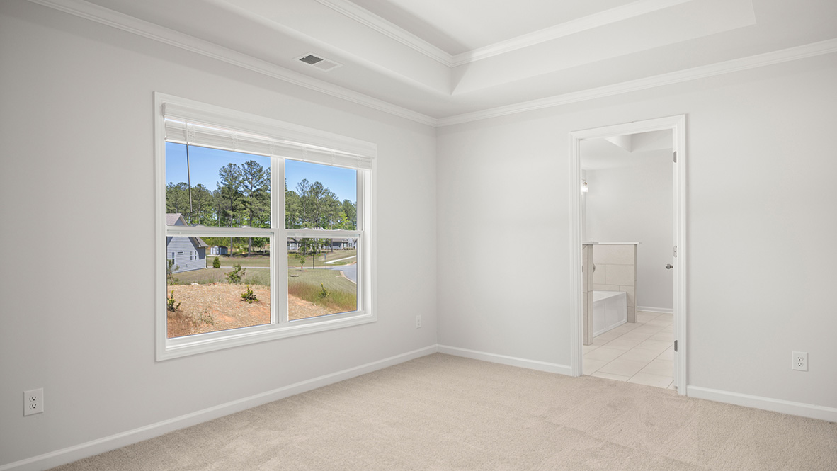 sonoma primary bedroom with sitting room at genesee in newnan georgia
