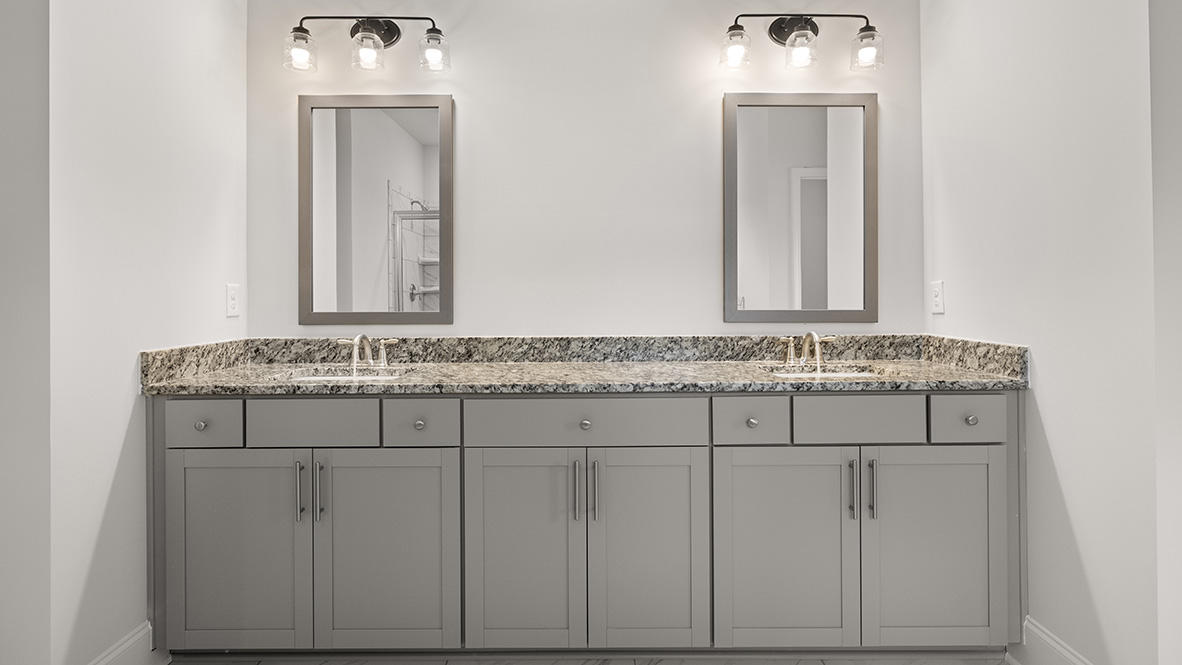 tisdale primary bathroom with dual vanity at genesee in newnan georgia