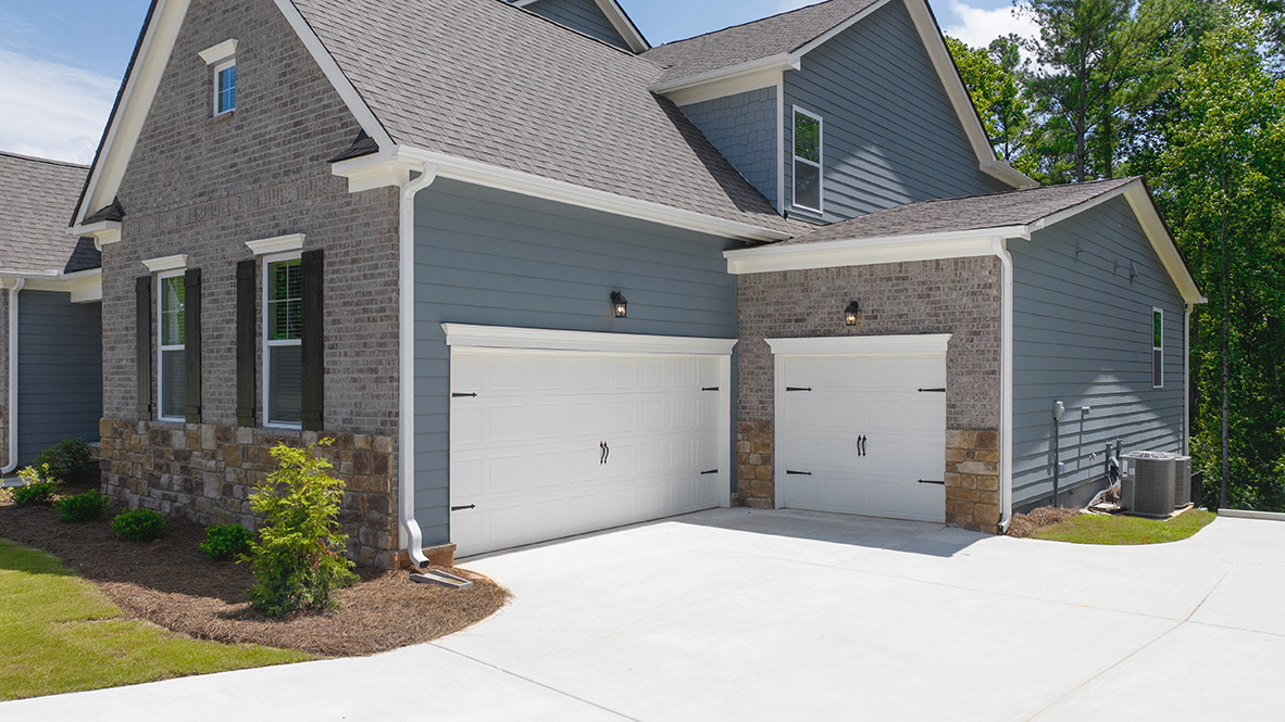 tisdale elevation e exterior with 3 car garage at genesee in newnan georgia