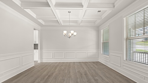 sample edinburgh dining room with coffered ceilings at tributary village in douglasville georgia