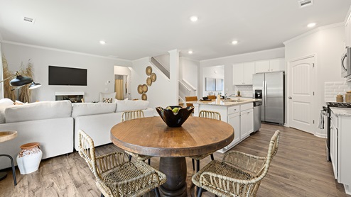 model home open kitchen with large island in the braselton village in braselton georgia