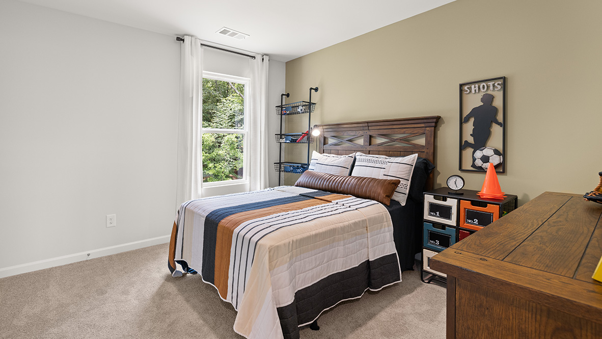 model home secondary bedroom in the braselton village in braselton georgia