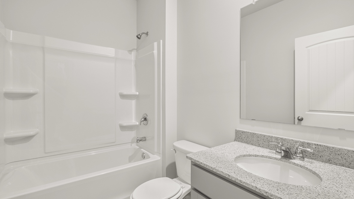 Interior bathroom with sink and full-sized shower