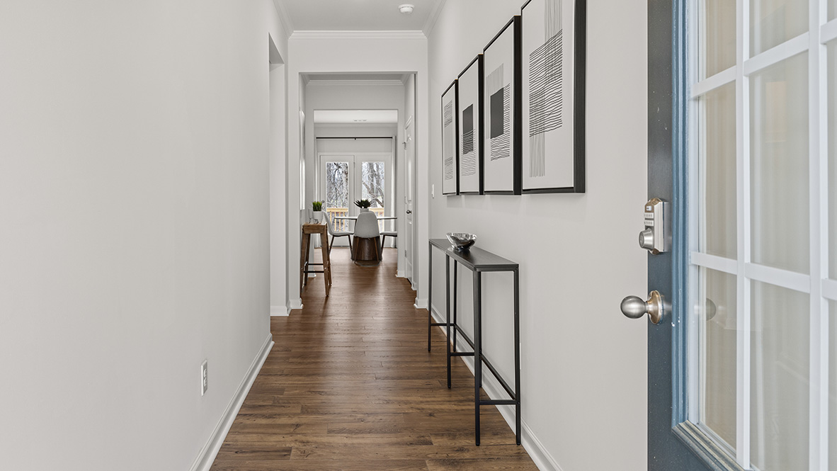 ntry Foyer of Hanover Plan crafted by D.R. Horton with welcoming hallway and access to guest bedrooms in Lost Creek